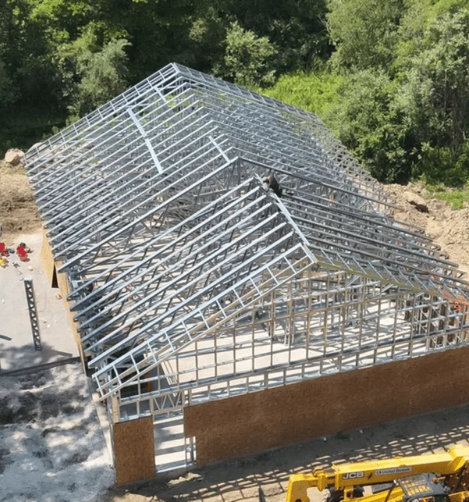 Aerial view of steel frame barndominium construction in Kentucky